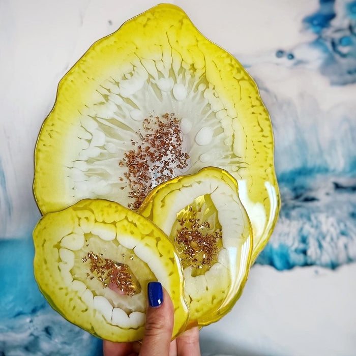 Pigment Paste Lemon in translucent epoxy resin art showcasing intricate textures and vivid colors.
