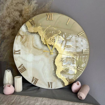 Round wall clock in gold and light tones in resin art style, made from Artline Honey Epoxy Resin