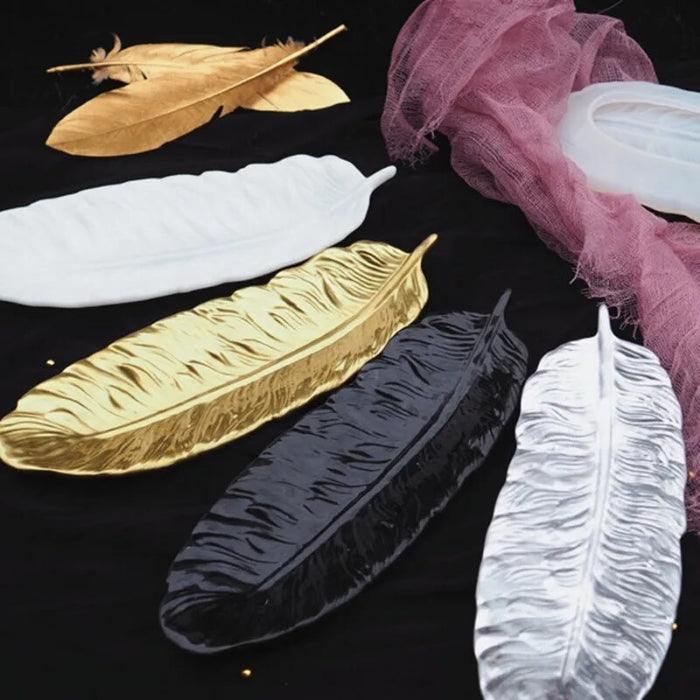 Moule en silicone en forme de plume, translucide, 24x8,8 cm.