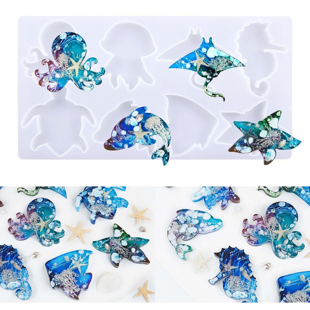 Silicone mold for ocean animal crafts, 25.7x13.4x0.8 cm, includes 8 marine shapes: turtle, dolphin, fish, octopus, jellyfish, starfish, seahorse, stingray.