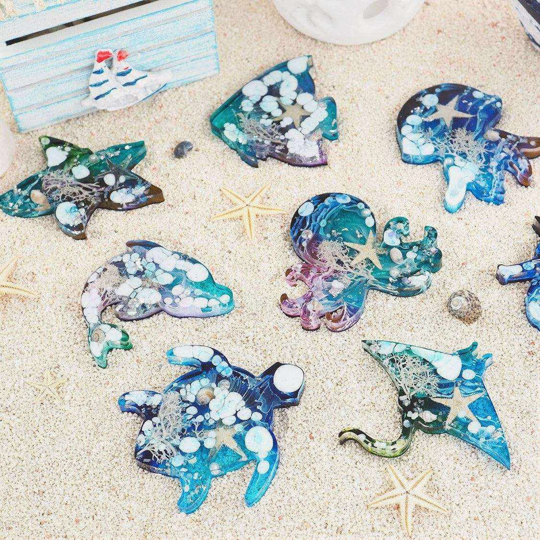 Silicone mold with ocean animal shapes for resin crafts, translucent, 25.7x13.4x0.8 cm.