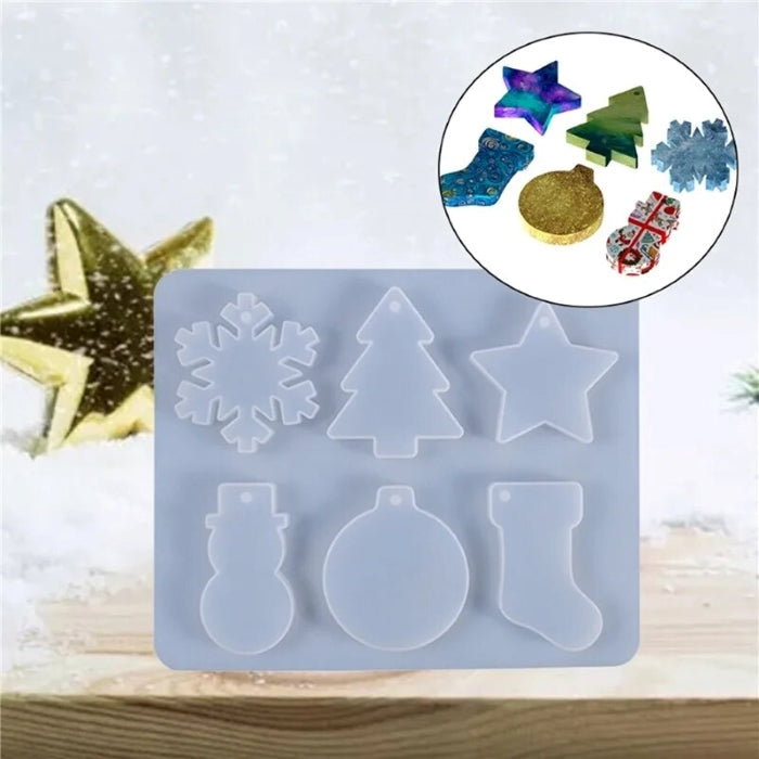 Silicone mold for Christmas ornaments, 20.4x24.6 cm, translucent design with festive shapes including snowflake, tree, star, and more.