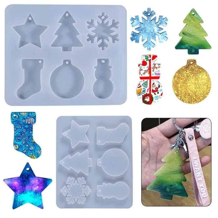 Translucent silicone mold with Christmas ornament shapes including star, tree, snowflake, stocking, ball, and snowman for resin crafting.