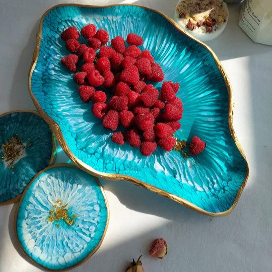 Resin art coasters with raspberries showcasing high viscosity Extra Honey Epoxy Resin.