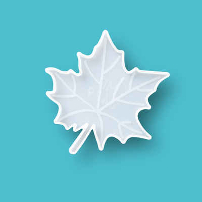 Silicone mold shaped like a translucent maple leaf, dimensions 11.9x12x1 cm, ideal for crafting.