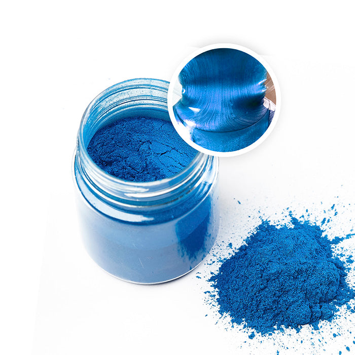 Blue metallic pigment powder in a jar, showcasing its shimmer and intense color payoff for resin art and crafts.